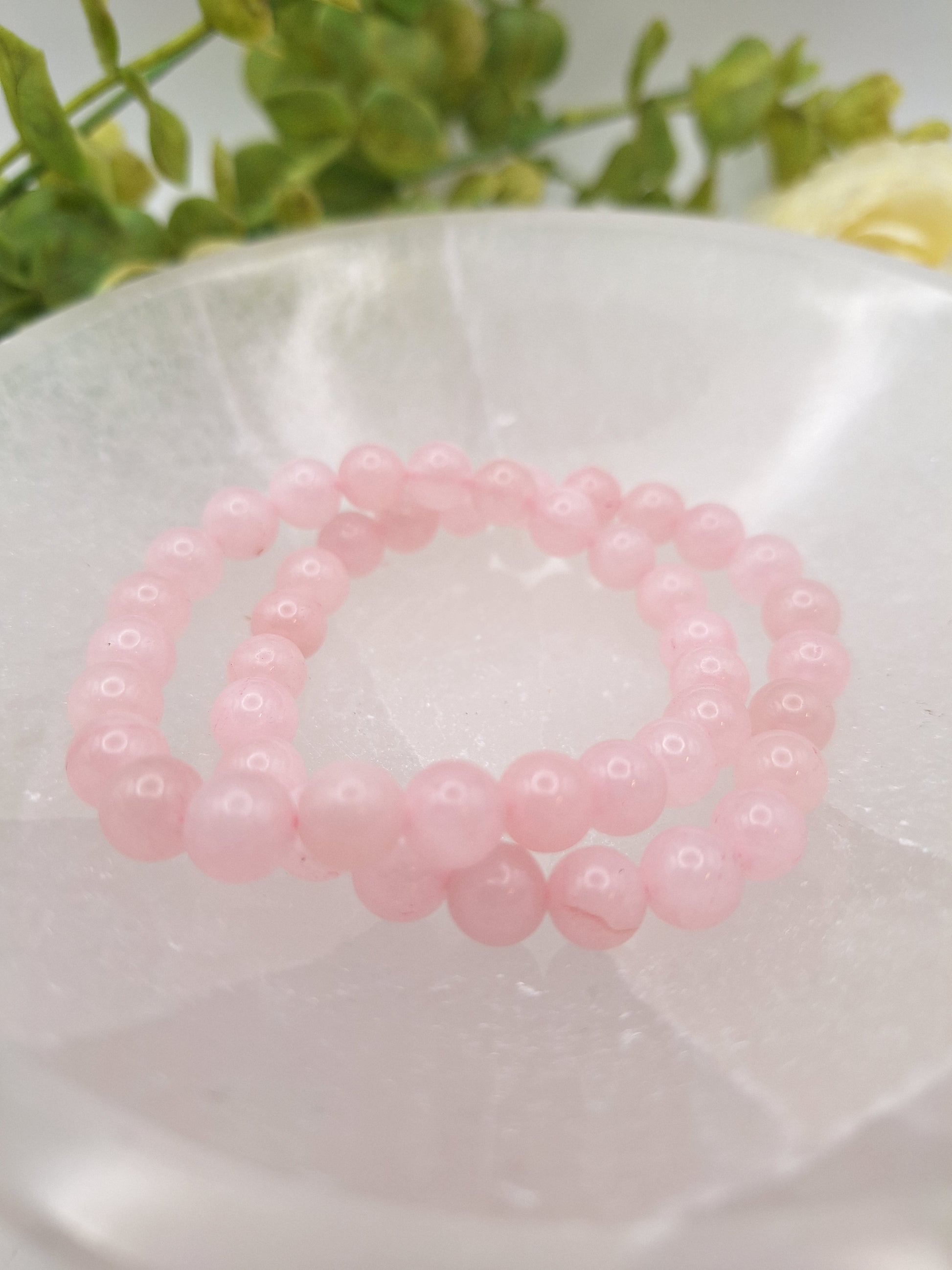 Rose quartz 8mm beaded stretchy bracelet for healing and compassion. Supports the hearth chakra and matters of love.