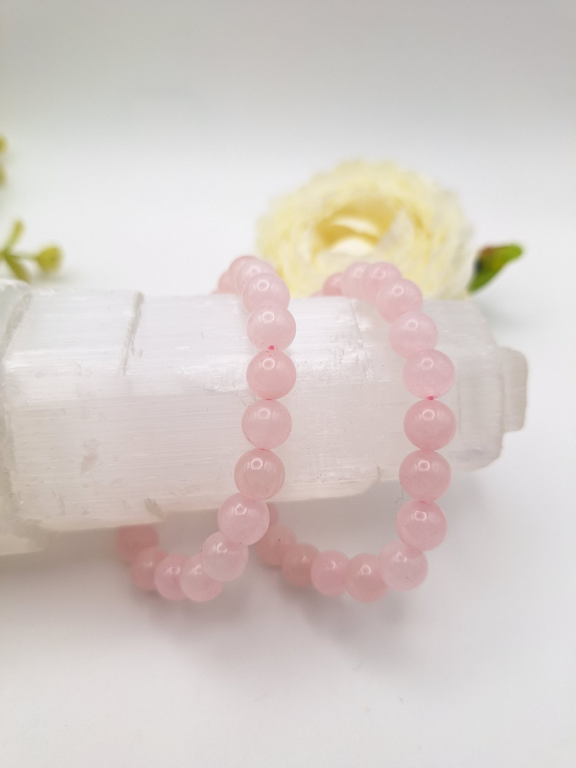8mm rose quartz bracelet with soft pink beads, symbolizing love, compassion, and emotional healing. A nurturing Heart Chakra stone, perfect for self-love and relationships. Stretchy, unisex.