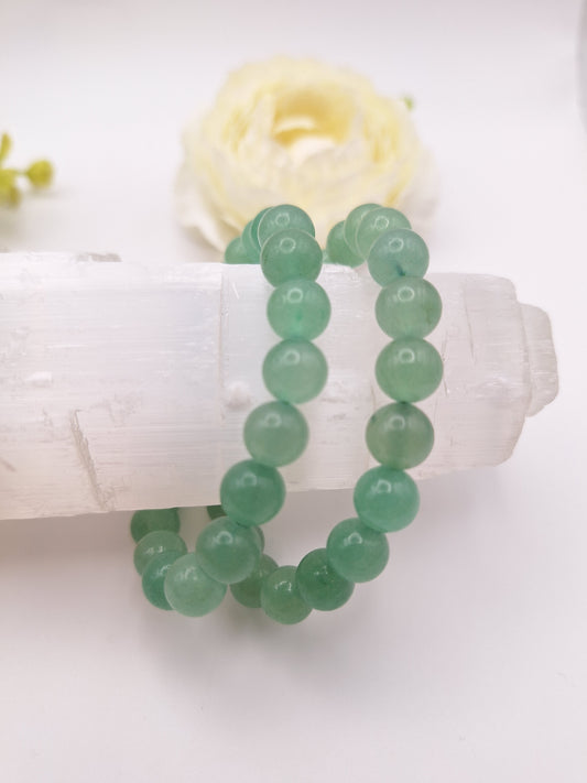 8mm green aventurine bracelet, known for courage, confidence, and attracting new opportunities. A heart chakra stone promoting optimism and happiness. Stretchy, unisex design